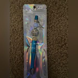 Beautiful beaded pen with dangle charm